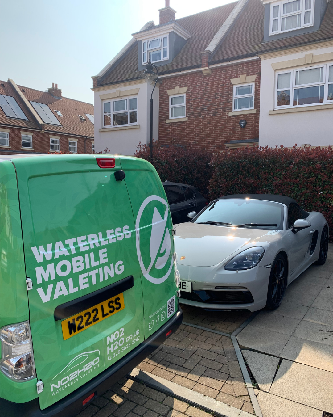 White Porsche 718 Boxster valeted next to the NO2H2O waterless mobile valeting van on a private driveway